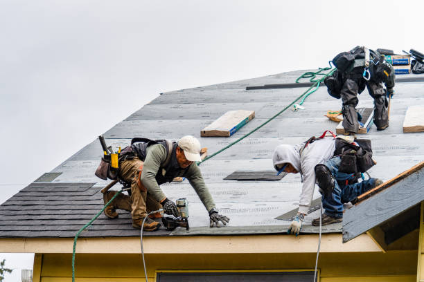 Professional Roof Replacement technician working in Annandale On Hudson, NY